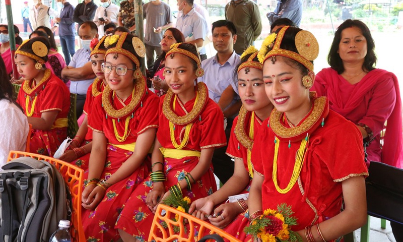 Students and teachers are seen during the launch ceremony in Kathmandu, Nepal, July 11, 2022.(Photo: Xinhua)