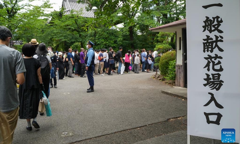 People wait in line to mourn for Japan's former Prime Minister Shinzo Abe in Tokyo, Japan, July 12, 2022. A funeral was held on Tuesday in central Tokyo for Abe, who was shot dead while delivering a speech last week.(Photo: Xinhua)