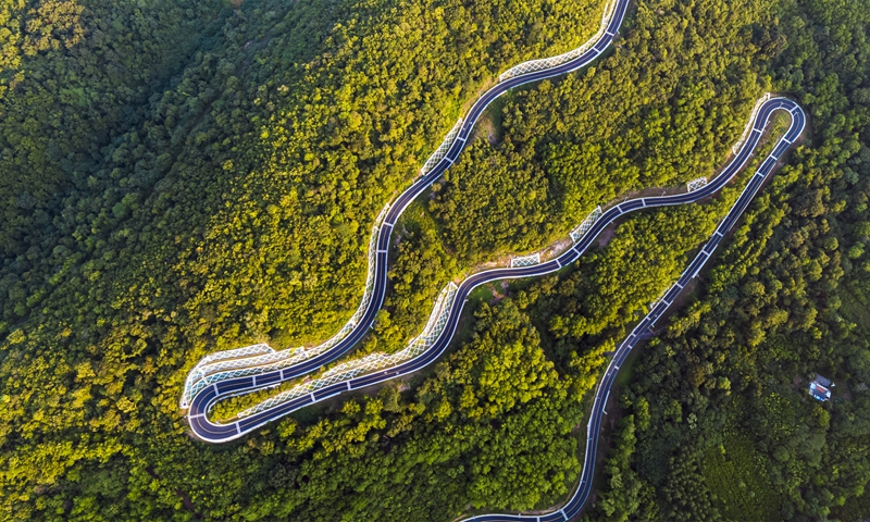 An aerial photo taken on July 24, 2022, shows winding mountain road in Nanjing, East China's Jiangsu Province. Photo: VCG