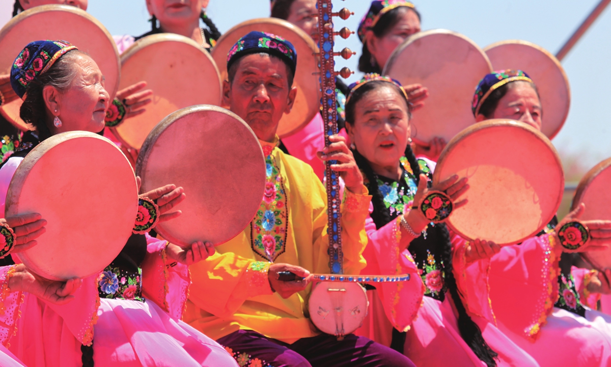 Uygur entertainers perform the Uygur Muqam in Yiwu county, Northwest China's Xinjiang Uygur Autonomous Region on June 12, 2022. Photo: IC