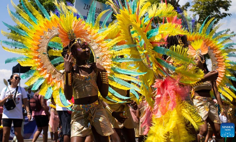 Dressed-up girls dance during the junior parade of the 2022 Toronto Caribbean Carnival in Toronto, Canada, on July 16, 2022.Photo:Xinhua