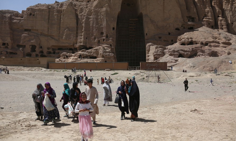 Tourists visit the site of the giant Buddha ruins in Bamiyan province, Afghanistan, July 10, 2022.Photo:Xinhua