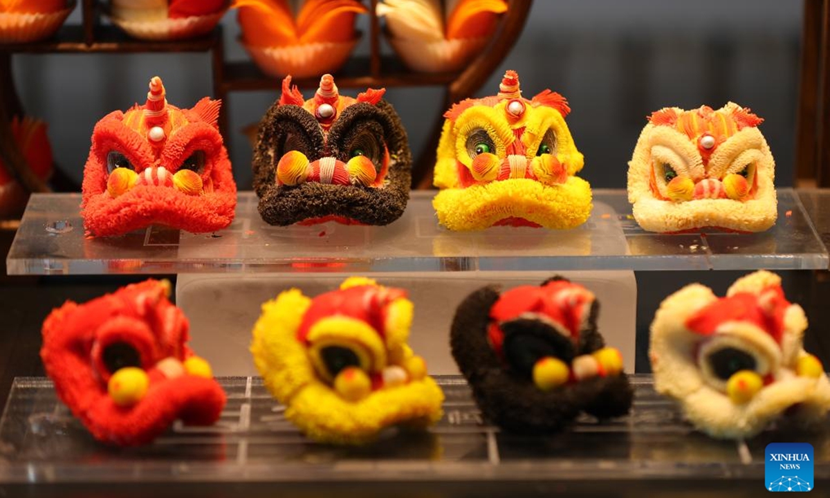 Chef Wu Yang makes a pastry at his studio in Shenyang, capital of northeast China's Liaoning Province, July 14, 2022. Wu Yang, a 35-year-old chef, has made pastry for ten years. Inspired by traditional Chinese culture, he has created various pastries with vivid shapes at his studio. (Xinhua/Yang Qing)