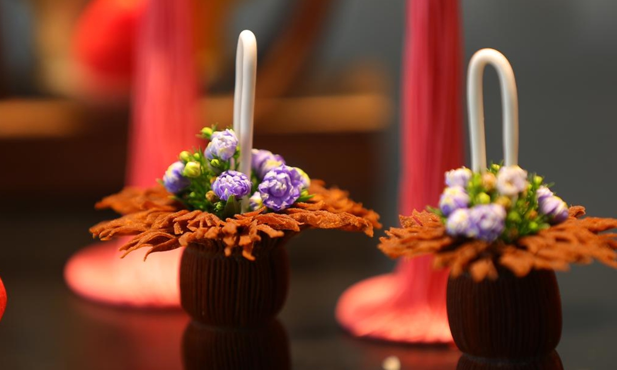 Photo taken on July 14, 2022 shows Chinese style pastries made by chef Wu Yang in Shenyang, capital of northeast China's Liaoning Province. Wu Yang, a 35-year-old chef, has made pastry for ten years. Inspired by traditional Chinese culture, he has created various pastries with vivid shapes at his studio. (Xinhua/Yang Qing)