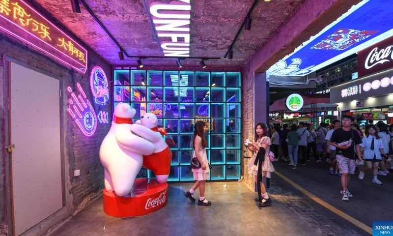 People tour a local market at the Qingyun Road in Nanming District of Guiyang, capital city of southwest China's Guizhou Province, July 21, 2022. Photo: Xinhua