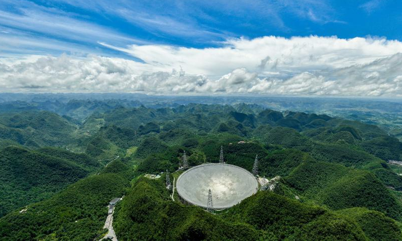Aerial photo taken on July 21, 2022 shows China's Five-hundred-meter Aperture Spherical Radio Telescope (FAST) under maintenance in southwest China's Guizhou Province. Using FAST, also dubbed as the China Sky Eye, scientists have identified over 660 new pulsars since October 2017. Photo: Xinhua