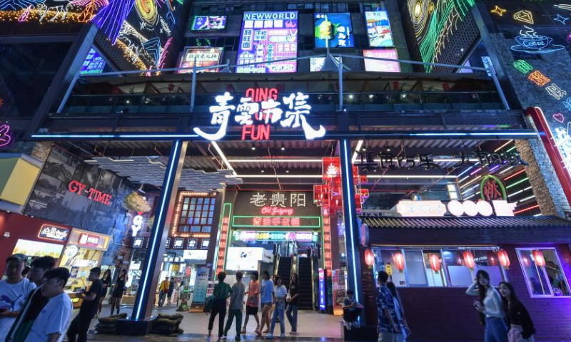 People tour a local market at the Qingyun Road in Nanming District of Guiyang, capital city of southwest China's Guizhou Province, July 21, 2022. Photo: Xinhua