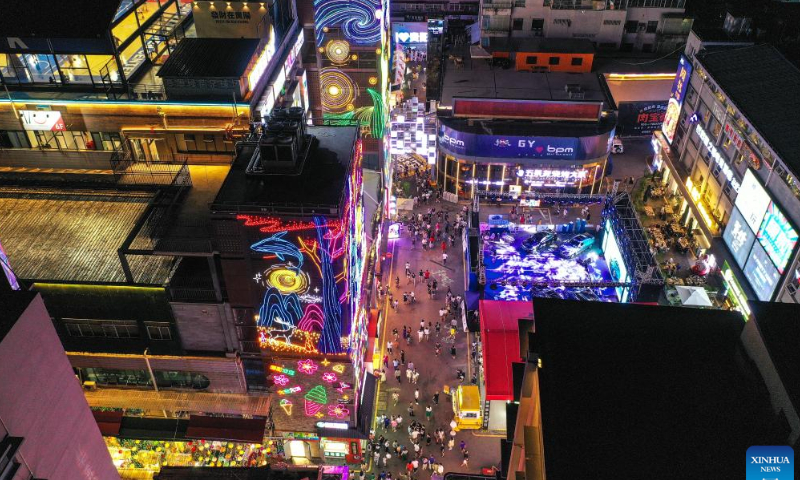 In this aerial photo, people tour a local market at the Qingyun Road in Nanming District of Guiyang, capital city of southwest China's Guizhou Province, July 22, 2022. Photo: Xinhua