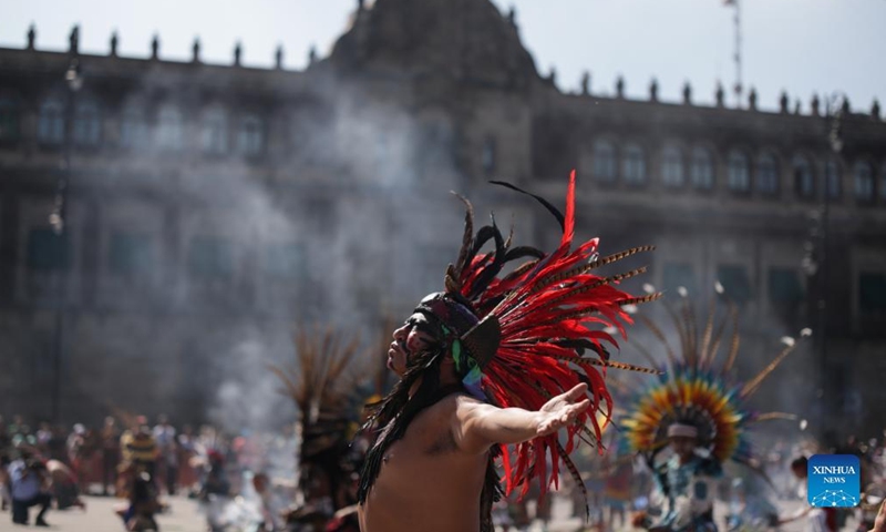 Dancers perform during the celebration for the 697th anniversary of the foundation of Tenochtitlan at Zocalo square in Mexico City, Mexico, July 26, 2022. (Photo by Francisco Canedo/Xinhua)