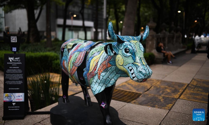 Photo taken on July 24, 2022 shows a cow sculpture displayed during the CowParade event in Mexico City, Mexico. (Xinhua/Xin Yuewei)