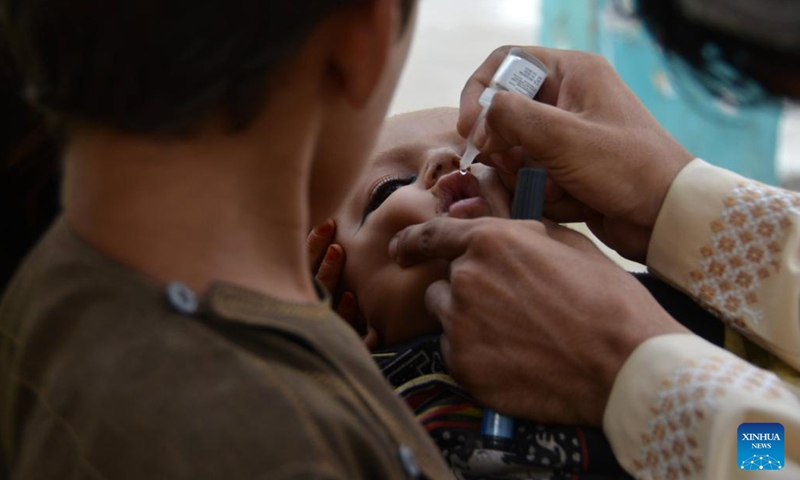 An Afghan child receives polio vaccine in Kandahar province, Afghanistan, July 25, 2022. A three-day anti-polio campaign has started in Kandahar province.(Photo: Xinhua)