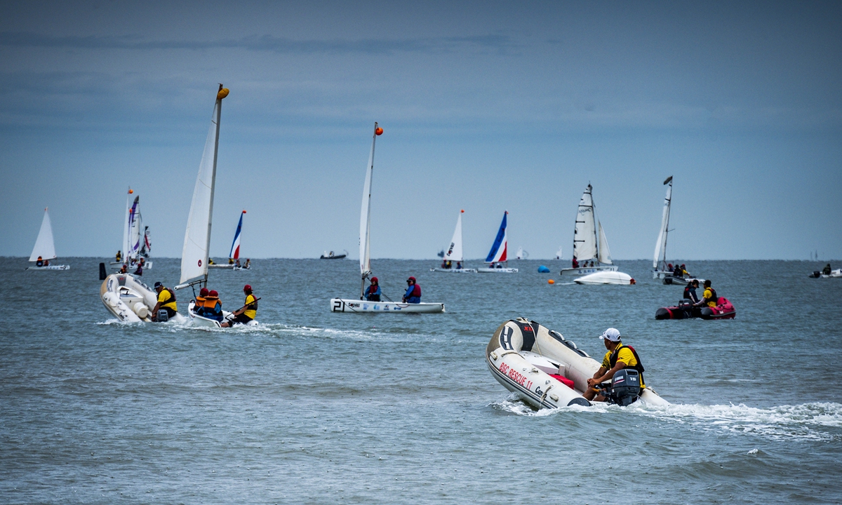 Sailboats ride the waves during a summer sailing festival in Qinhuangdao, North China's Hebei Province on August 10, 2022. Photo: CFP