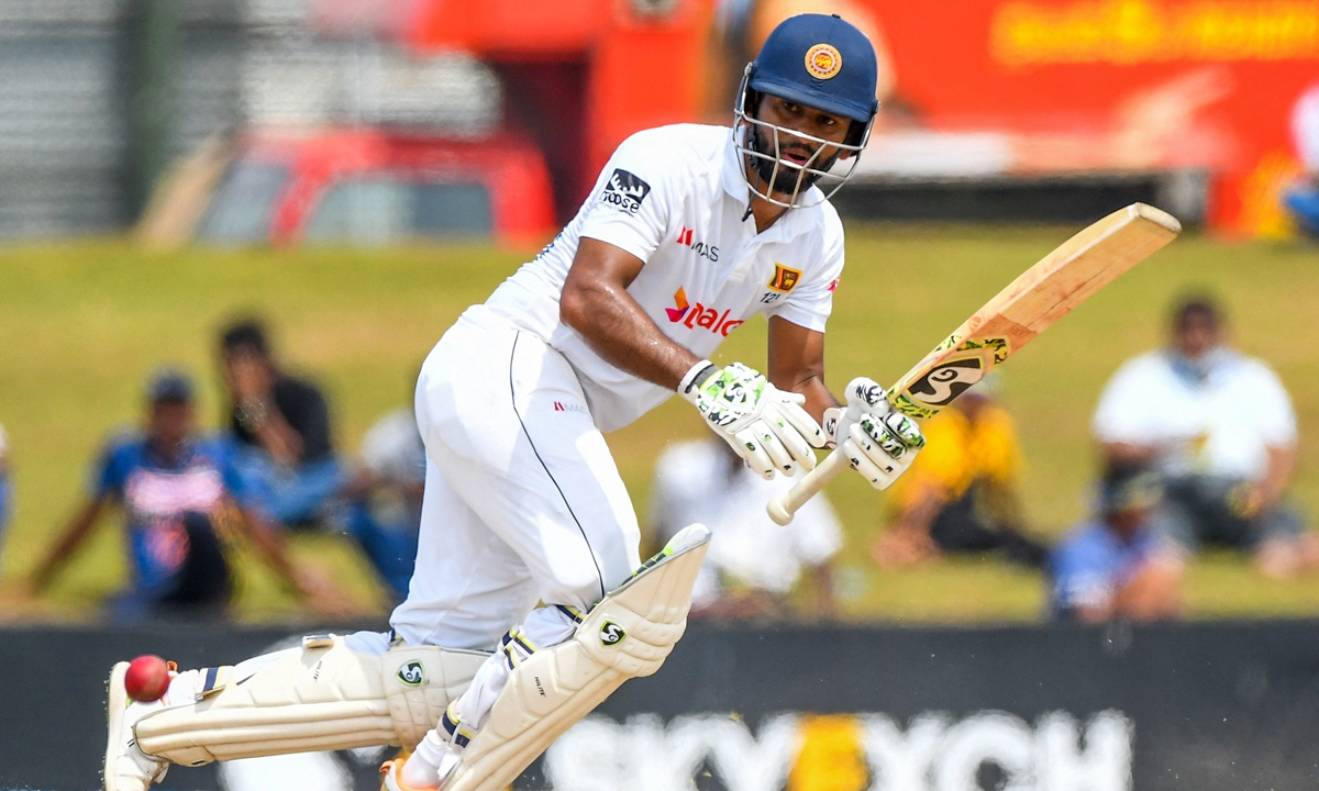 Sri Lanka's captain Dimuth Karunaratne plays a shot during the fourth day of the second cricket Test match between Sri Lanka and Pakistan at the Galle International Cricket Stadium in Galle, Sri Lanka on July 27, 2022. Photo: AFP