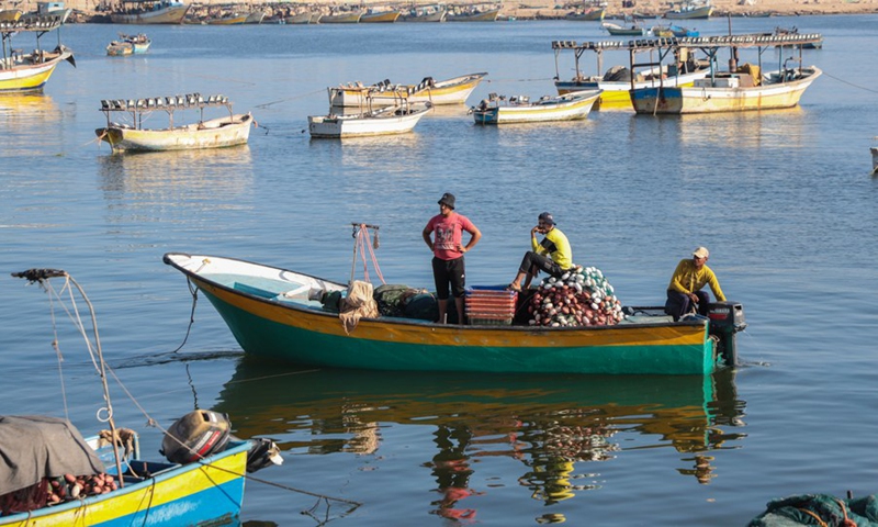 Palestinian fishermen go fishing in the Gaza sea on July 26, 2022. (Photo: Xinhua)