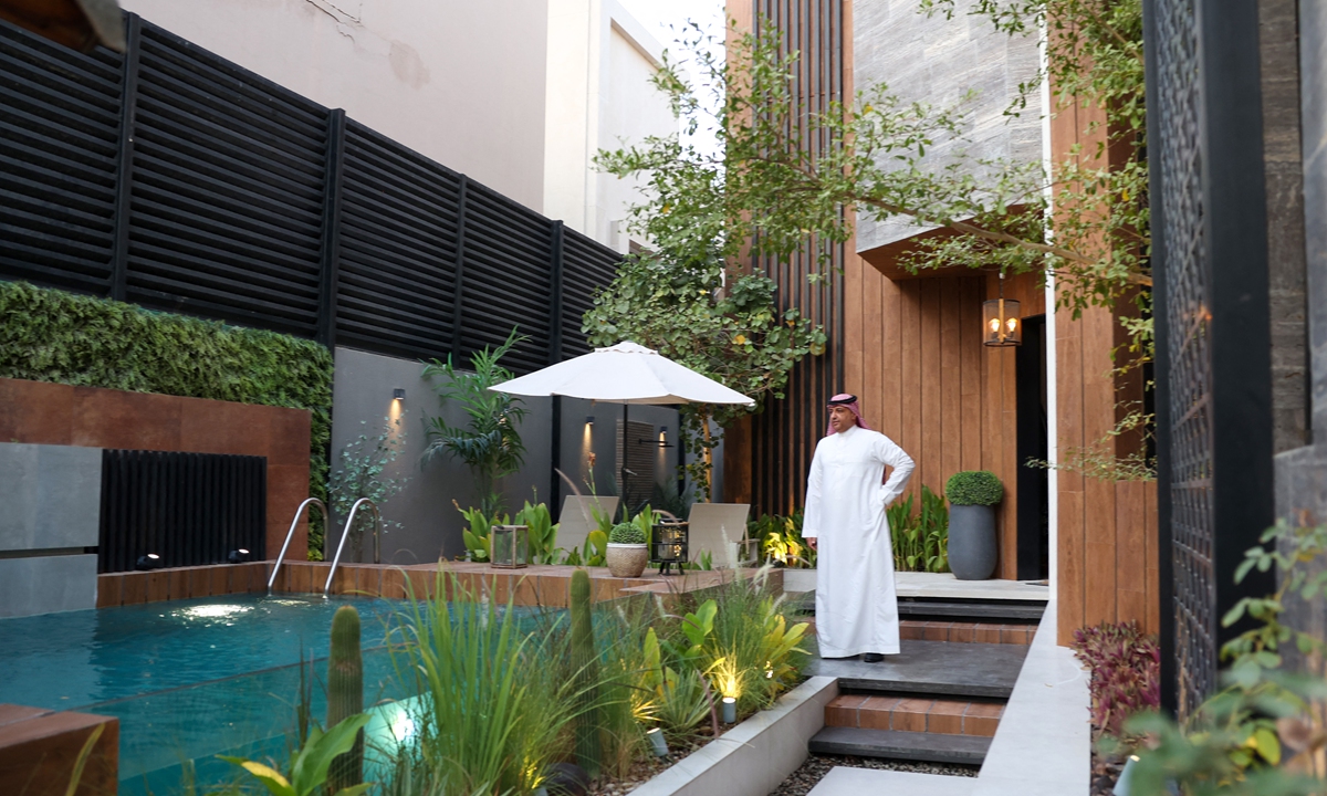 Haitham al-Madini stands next to the pool in his recently renovated villa in the Saudi capital Riyadh on June 22, 2022. Haitham al-Madini walks around his recently renovated villa in the Saudi capital Riyadh on June 22, 2022. Photos: AFP  