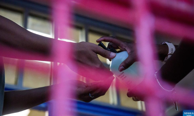 A man sanitizes his hands at a monkeypox vaccination site in the Brooklyn borough of New York, the United States, on July 30, 2022. New York Governor Kathy Hochul declared a state disaster emergency late Friday night due to the growing monkeypox cases in the state. Photo: Xinhua