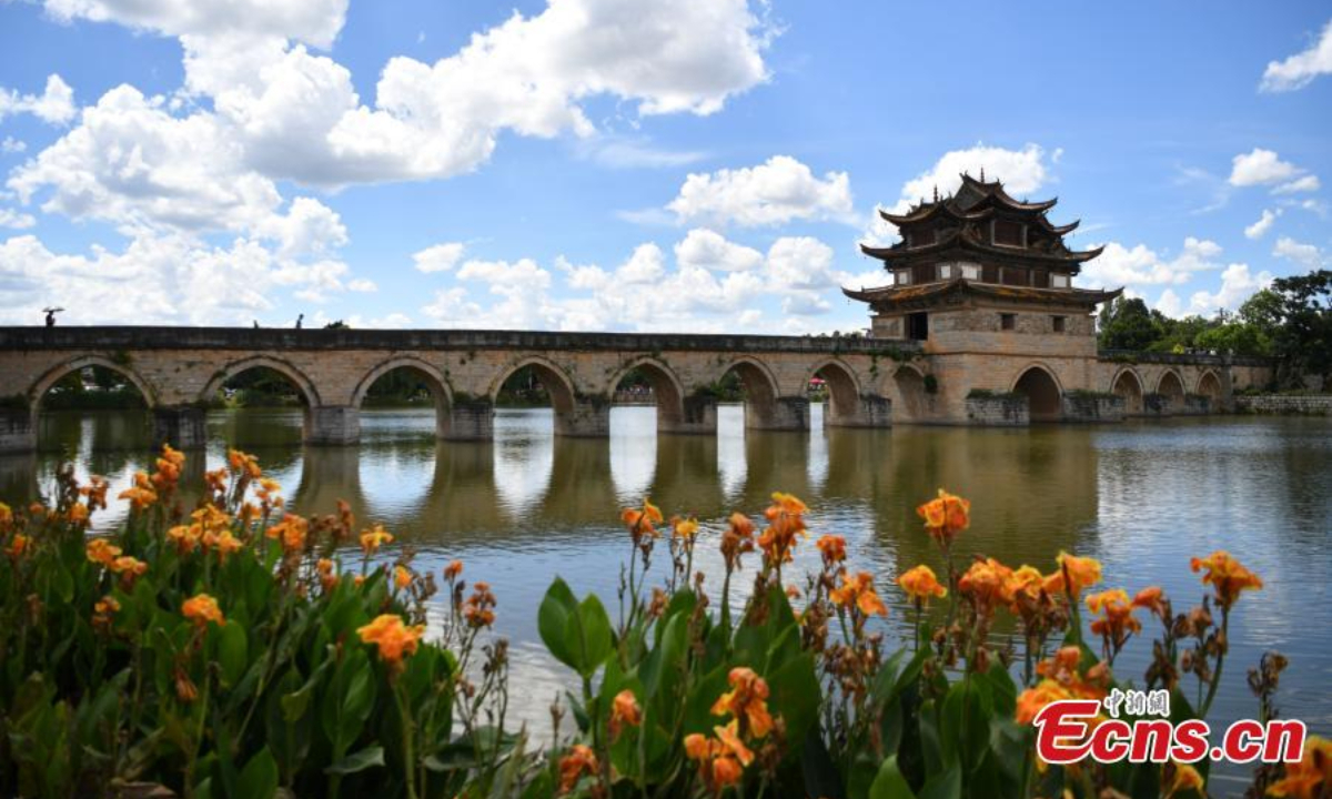 The Shuanglong Bridge(Double Dragon Bridge), 148 meters long and about 9 meters high, is among the best large-scaled ancient bridges in China. It was built as a three-arch stone bridge in the Qianlong reign(1735-1796) of the Qing Dynasty and became a seventeen-arch bridge in Daoguang reign(1820-1850) in Jiangshui county of Honghe Hani and Yi Autonomous Prefecture, southwest China's Yunnan Province. It was reconstructed in 1898 when a triple-eave square pavilion was built upright in its middle. Photo:China News Service