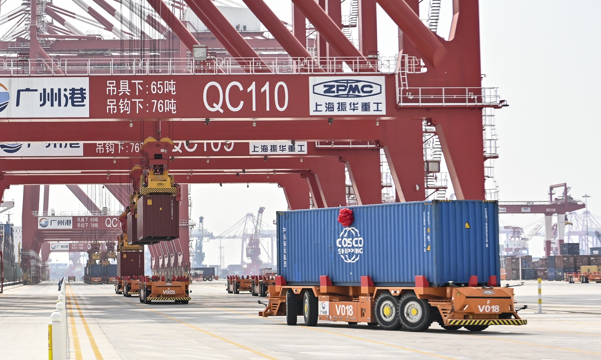 The world's first fully automated river-sea-railway multimodal port goes into operation in Guangzhou, South China's Guangdong Province, on July 28, 2022. It has a designed annual throughput of 4.9 million standard containers, and it uses the BeiDou Navigation Satellite System, 5G, artificial intelligence, autonomous driving and other technologies. Photo: IC