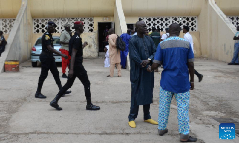 People wait outside a polling station to vote in Dakar, Senegal, on July 31, 2022. Senegal kicked off legislative elections at 8 a.m. Sunday (local time and GMT) to elect 165 new deputies to the National Assembly for a five-year term across national territory and abroad. Photo: Xinhua
