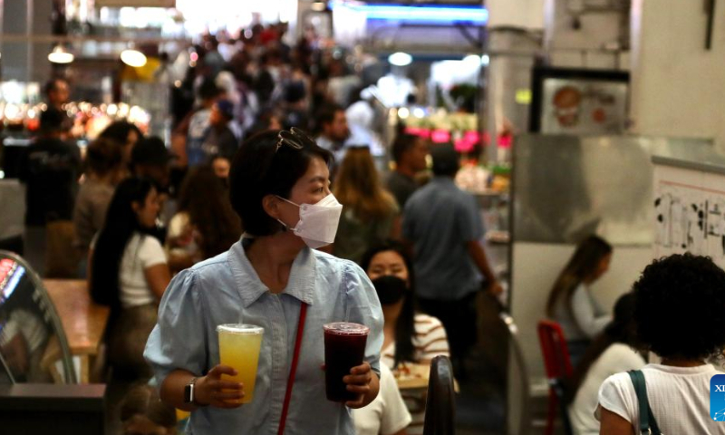 Customers are seen at the Grand Central Market in Los Angeles, California, the United States, July 29, 2022. Los Angeles County in the U.S. state of California has dropped plans to reinstitute a COVID-19 mask mandate amid falling number of cases and hospitalizations. Health officials in the county, which has a population of 10 million people, had planned to make masks indoors mandatory from Friday. Photo: Xinhua