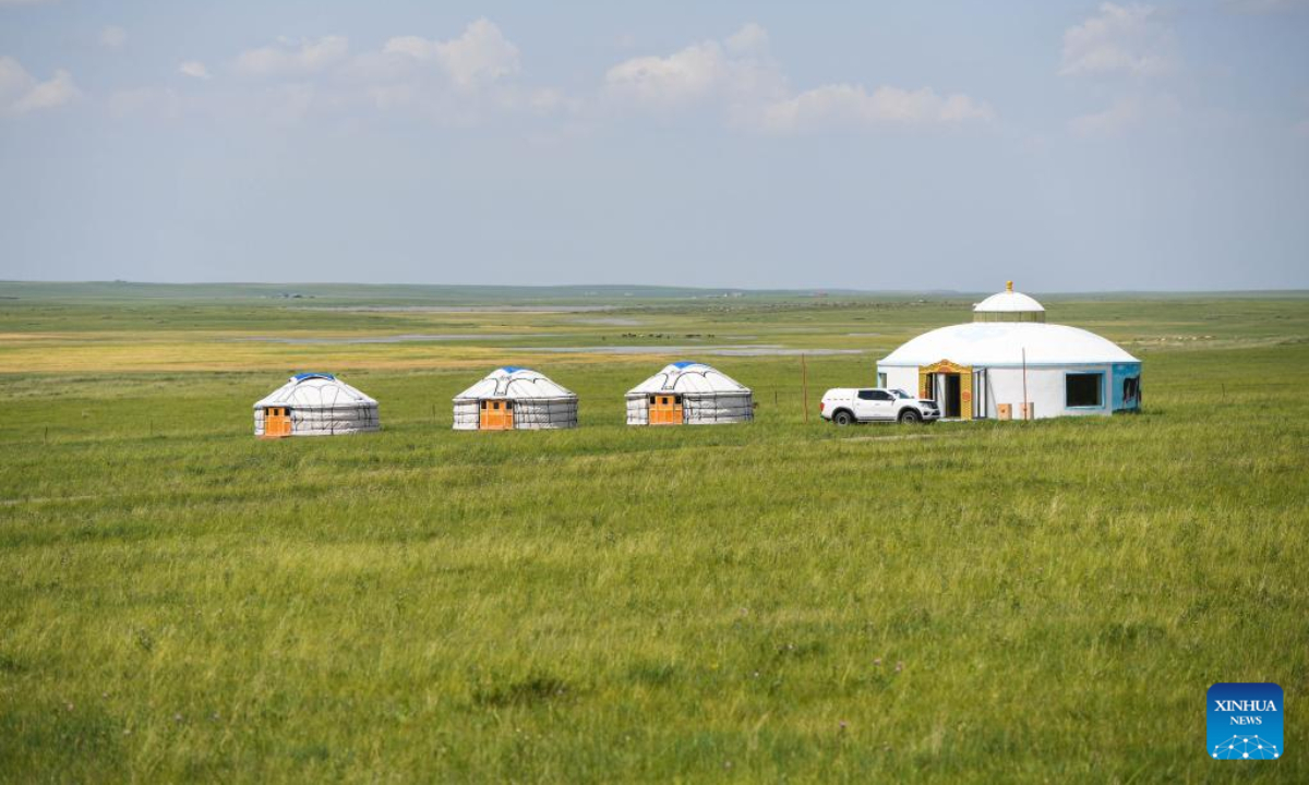 Photo taken on July 27, 2022 shows Mongolian yurts on a grassland in the Eastern Ujimqin Banner of the Xilingol League in north China's Inner Mongolia Autonomous Region.  Photo: Xinhua