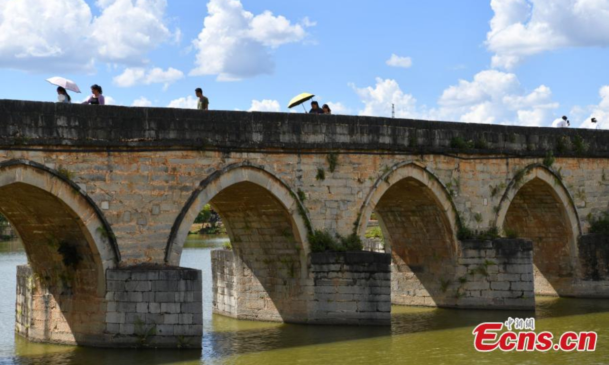The Shuanglong Bridge(Double Dragon Bridge), 148 meters long and about 9 meters high, is among the best large-scaled ancient bridges in China. It was built as a three-arch stone bridge in the Qianlong reign(1735-1796) of the Qing Dynasty and became a seventeen-arch bridge in Daoguang reign(1820-1850) in Jiangshui county of Honghe Hani and Yi Autonomous Prefecture, southwest China's Yunnan Province. It was reconstructed in 1898 when a triple-eave square pavilion was built upright in its middle. Photo:China News Service