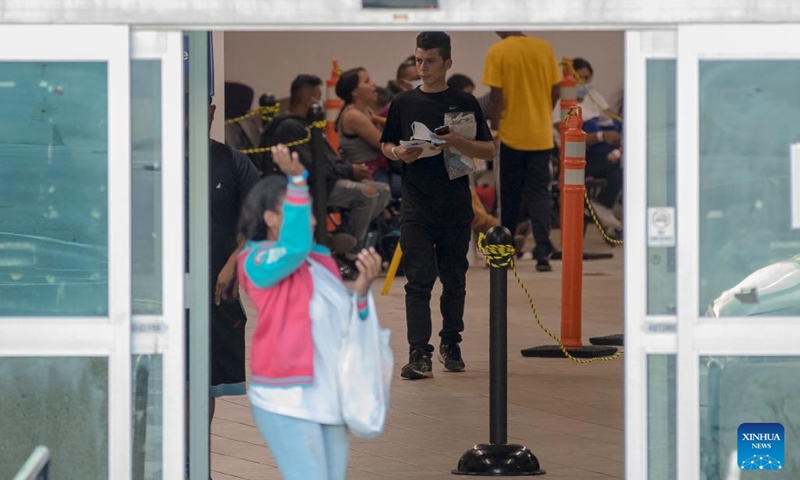 Migrants with pending asylum status wait inside a migrant resource center in San Antonio, Texas, the United States, on July 26, 2022. According to city officials, more than 70,000 migrants have arrived in San Antonio since March of 2022.(Photo: Xinhua)