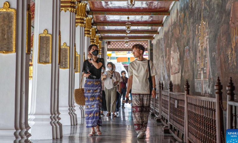 Tourists are seen at the Grand Palace scenic spot in Bangkok, Thailand, on July 31, 2022. Thailand received more than 2 million foreign tourists in the first half of 2022. According to the forecast of the Ministry of Tourism and Sports, the number of tourists is expected to reach 9 million in this year. Photo: Xinhua