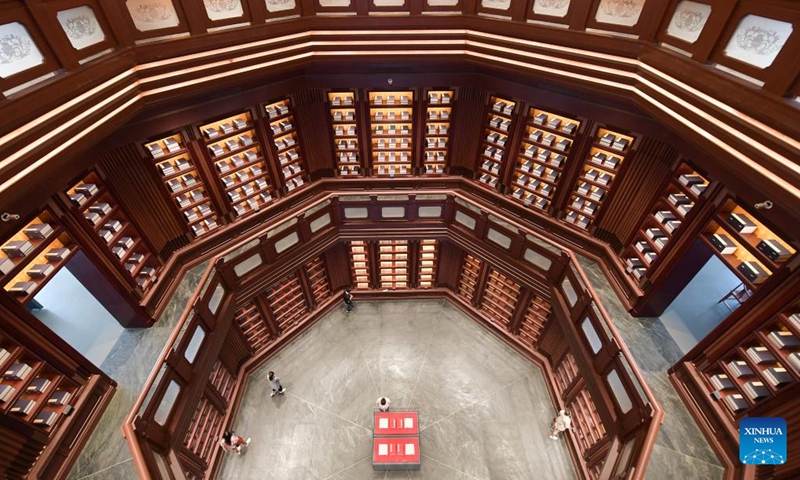 Visitors look at exhibits at the headquarters of the National Archives of Publications and Culture in Beijing, capital of China, July 30, 2022. Photo: Xinhua 