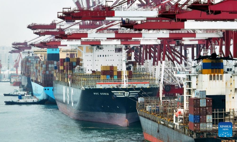 Aerial photo taken on July 29, 2022 shows container ships at the Qianwan Container Terminal in Qingdao Port, east China's Shandong Province. Photo: Xinhua 
