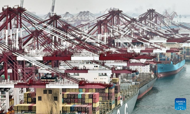 Aerial photo taken on July 29, 2022 shows container ships at the Qianwan Container Terminal in Qingdao Port, east China's Shandong Province. Photo: Xinhua 