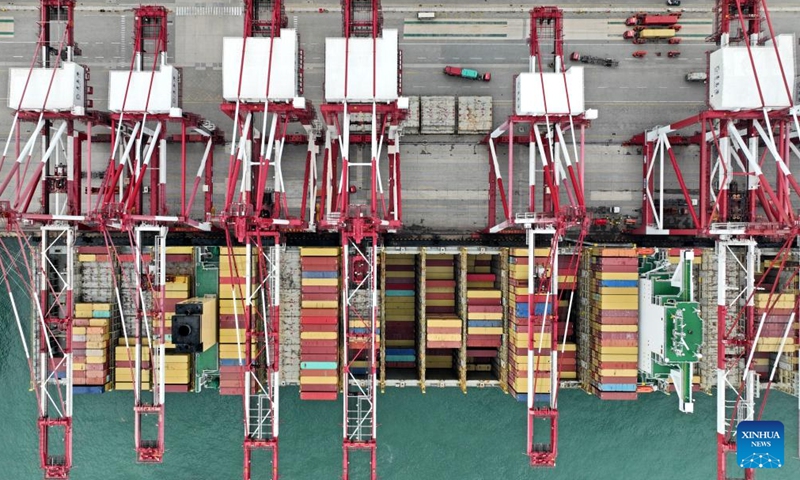 Aerial photo taken on July 29, 2022 shows a container vessel at the Qianwan Container Terminal in Qingdao Port, east China's Shandong Province. Photo: Xinhua 