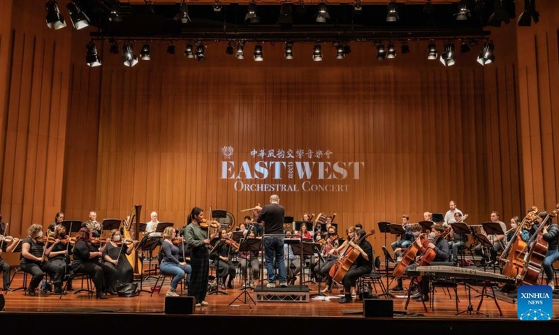 Photo taken on July 30, 2022 shows the East Meets West orchestral concert in Llewellyn Hall at the Australian National University in Canberra, Australia. East Meets West orchestral concert tour in Australia was held in Canberra on Saturday night. (Photo by Chu Chen/Xinhua)