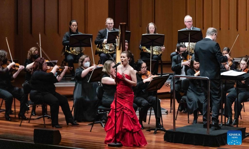 Photo taken on July 30, 2022 shows the East Meets West orchestral concert in Llewellyn Hall at the Australian National University in Canberra, Australia. East Meets West orchestral concert tour in Australia was held in Canberra on Saturday night. (Photo by Chu Chen/Xinhua)