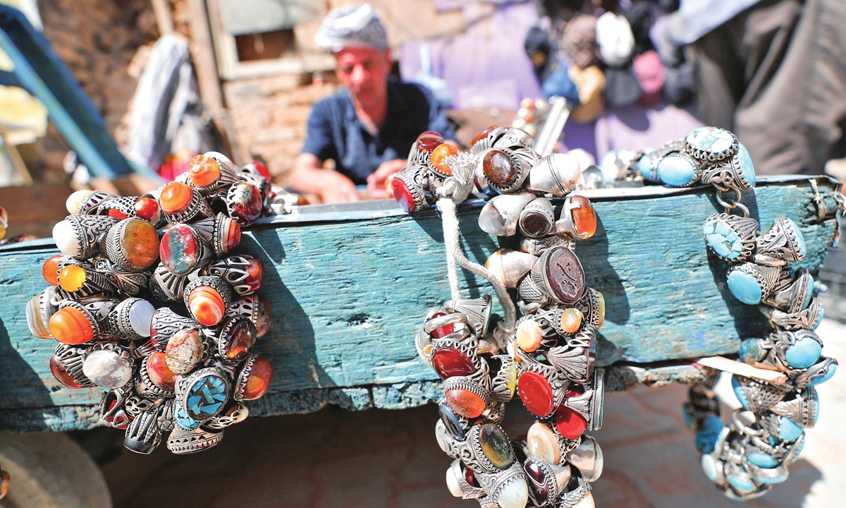 An Iraqi street vendor displays gemstone rings in the capital Baghdad on March 18, 2021. Photo: AFP
