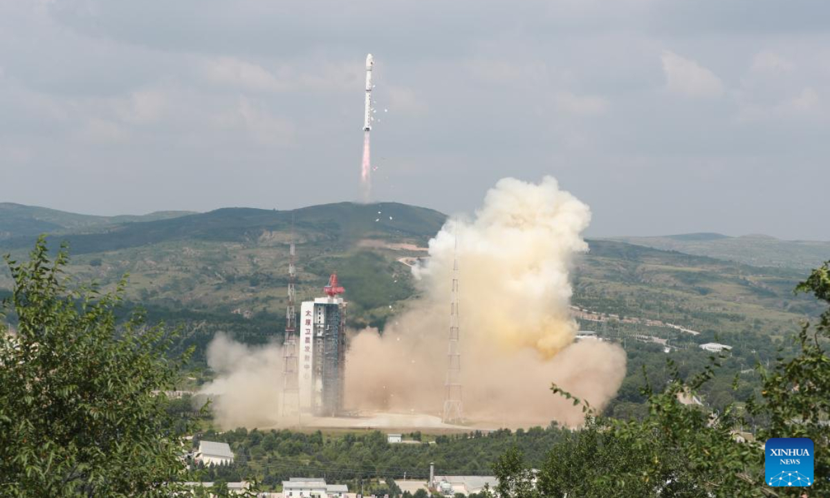 A Long March-4B carrier rocket carrying a terrestrial ecosystem carbon monitoring satellite and two other satellites blasts off from the Taiyuan Satellite Launch Center in north China's Shanxi Province on Aug 4, 2022. The satellites were launched at 11:08 am (Beijing Time) and entered the planned orbit successfully. Photo:Xinhua