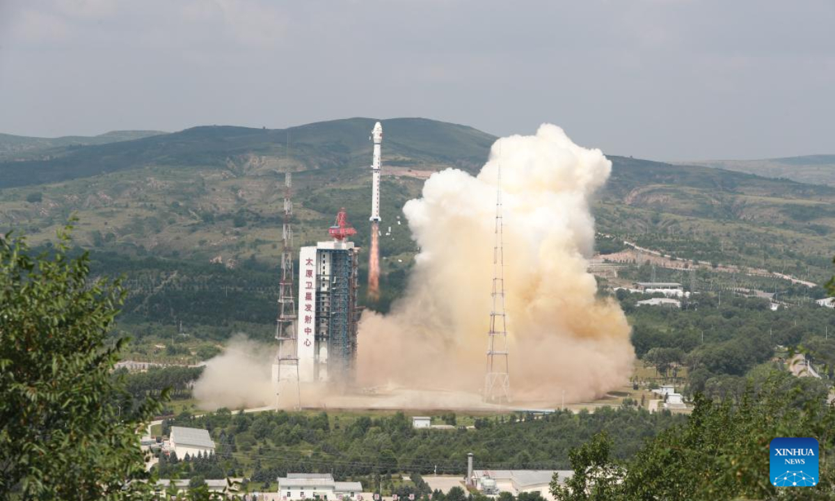 A Long March-4B carrier rocket carrying a terrestrial ecosystem carbon monitoring satellite and two other satellites blasts off from the Taiyuan Satellite Launch Center in north China's Shanxi Province on Aug 4, 2022. The satellites were launched at 11:08 am (Beijing Time) and entered the planned orbit successfully. Photo:Xinhua