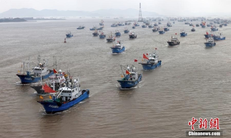 More than a thousand fishing boats set sail for fishing after a three-month fishing ban on the East China Sea in Zhoushan, east China's Zhejiang Province, August 1, 2022. (Photo provided to China News Service)