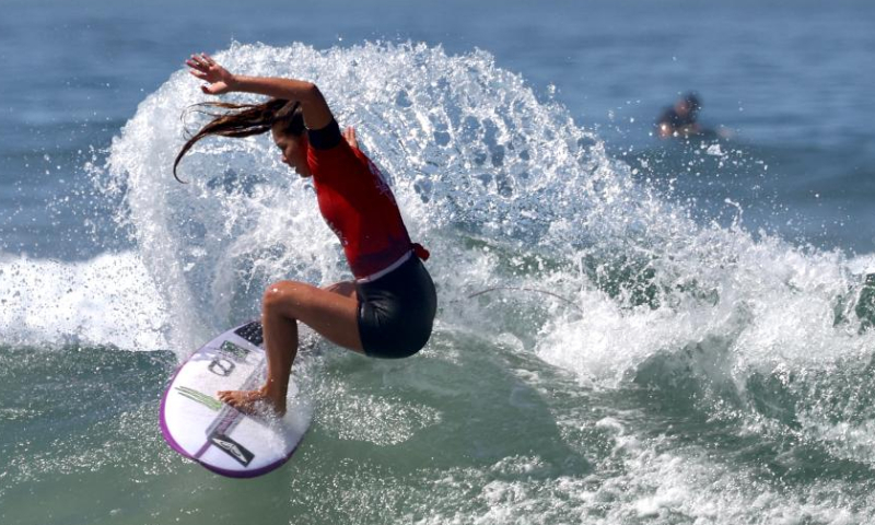 A surfer is seen during the competition of the Vans US Open of Surfing at Huntington Beach, California, the United States on Aug. 7, 2022. (Xinhua)