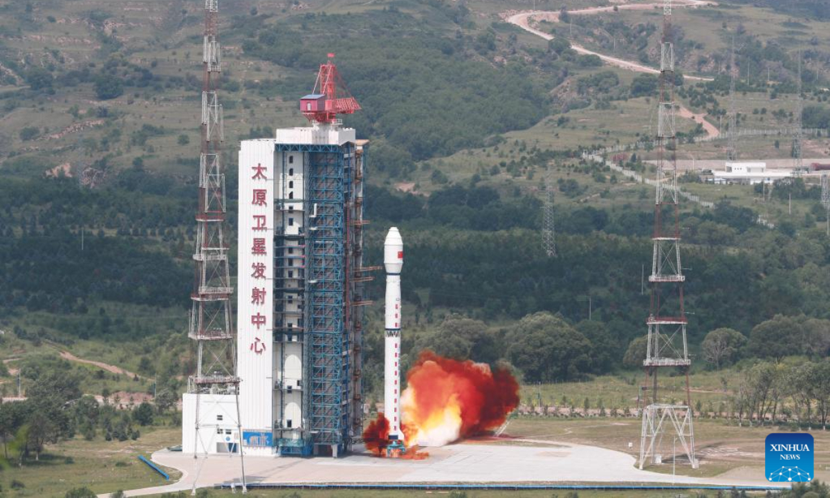 A Long March-4B carrier rocket carrying a terrestrial ecosystem carbon monitoring satellite and two other satellites blasts off from the Taiyuan Satellite Launch Center in north China's Shanxi Province on Aug 4, 2022. The satellites were launched at 11:08 am (Beijing Time) and entered the planned orbit successfully. Photo:Xinhua