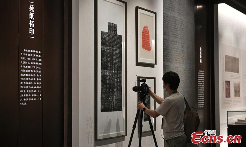 A visitor takes photo at the Guangzhou branch of the National Archives of Publications and Culture in Conghua District of Guangzhou, south China's Guangdong Province, July 30, 2022. (Photo: China News Service/Chen Chuhong