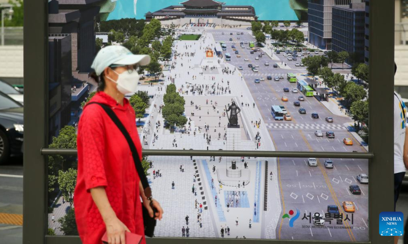 A citizen passes by the Gwanghwamun Square bus station in Seoul, South Korea, Aug. 6, 2022. Gwanghwamun Square, a major landmark in Seoul, opened to the public Saturday after nearly two years of renovation. Photo: Xinhua