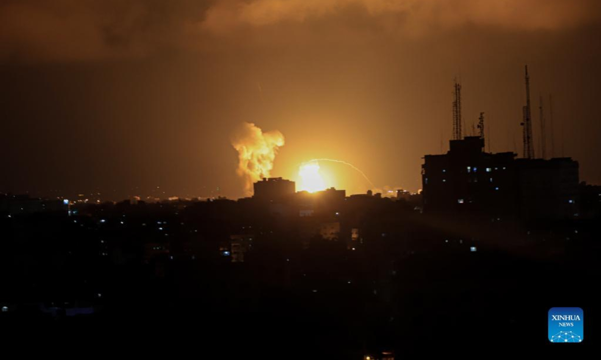Smoke and fire are seen following an Israeli airstrike in Gaza City on Aug. 5, 2022. Dozens of rockets were fired from the Gaza Strip into Israel on Friday evening by the Palestinian Islamic Jihad (PIJ), all of which were either intercepted or fell in open areas, causing no injuries, the Israeli military said. Photo:Xinhua