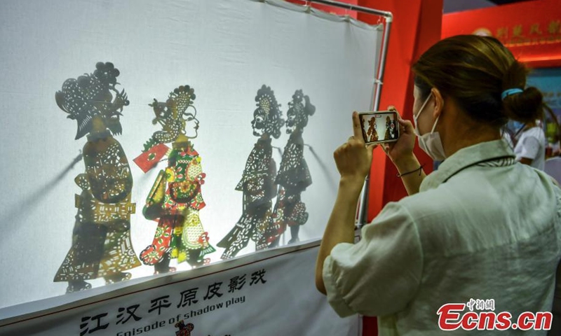 Puppy shadow play is on show during an intangible cultural heritage exhibition in Xinjiang Art Museum, Urumqi, northwest China's Xinjiang Uyghur Autonomous Region, July 31, 2022. (Photo: China News Service/Liu Xin)