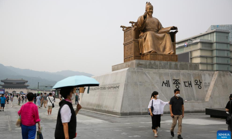 Visitors tour the Gwanghwamun Square in Seoul, South Korea, Aug. 6, 2022. Gwanghwamun Square, a major landmark in Seoul, opened to the public Saturday after nearly two years of renovation. Photo: Xinhua