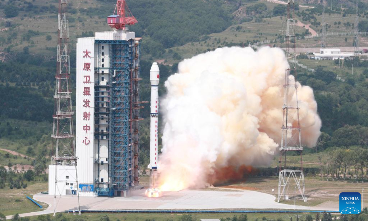 A Long March-4B carrier rocket carrying a terrestrial ecosystem carbon monitoring satellite and two other satellites blasts off from the Taiyuan Satellite Launch Center in north China's Shanxi Province on Aug 4, 2022. The satellites were launched at 11:08 am (Beijing Time) and entered the planned orbit successfully. Photo:Xinhua