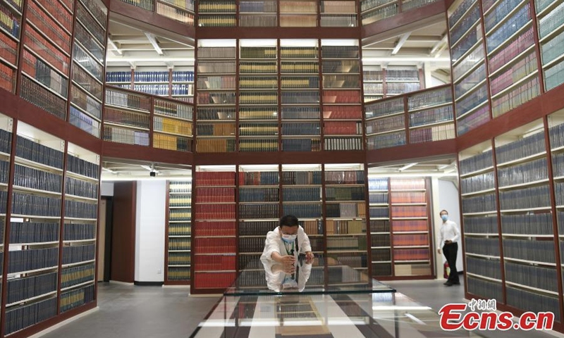 A visitor takes photo at the Guangzhou branch of the National Archives of Publications and Culture in Conghua District of Guangzhou, south China's Guangdong Province, July 30, 2022. (Photo: China News Service/Chen Chuhong)