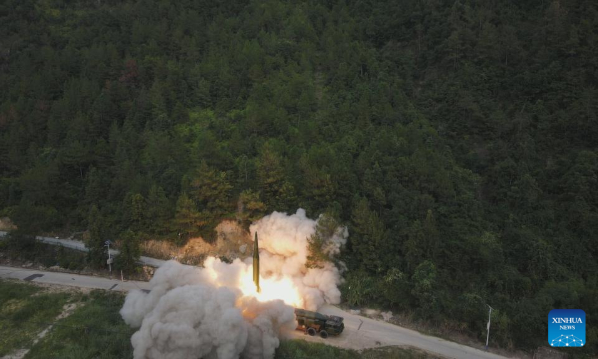 A missile is launched by the rocket force of the Eastern Theater Command of the Chinese People's Liberation Army (PLA), targeting designated maritime areas to the east of the Taiwan Island, Aug. 4, 2022. The Eastern Theater Command on Thursday conducted joint combat exercises and training around the Taiwan Island on an unprecedented scale. Photo:Xinhua