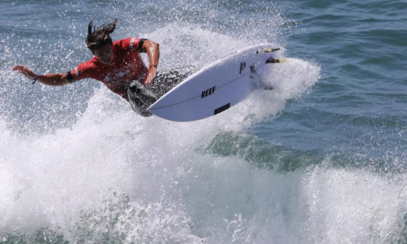 A surfer is seen during the competition of the Vans US Open of Surfing at Huntington Beach, California, the United States on Aug. 7, 2022. (Xinhua)