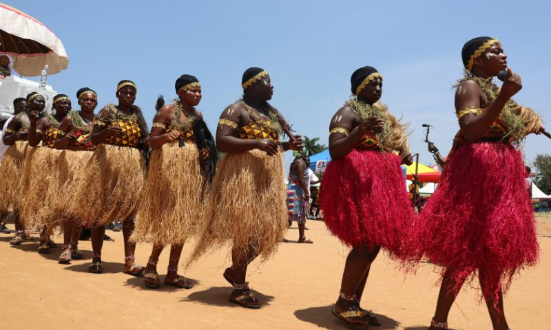 People perform traditional rituals during the Asafotufiami festival in southeastern town of Ada, Ghana, on Aug. 6, 2022. Ghanaians celebrated the traditional Asafotufiami festival with fanfare on Saturday in southeastern town of Ada after a two-year break due to COVID-19.  Photo: Xinhua